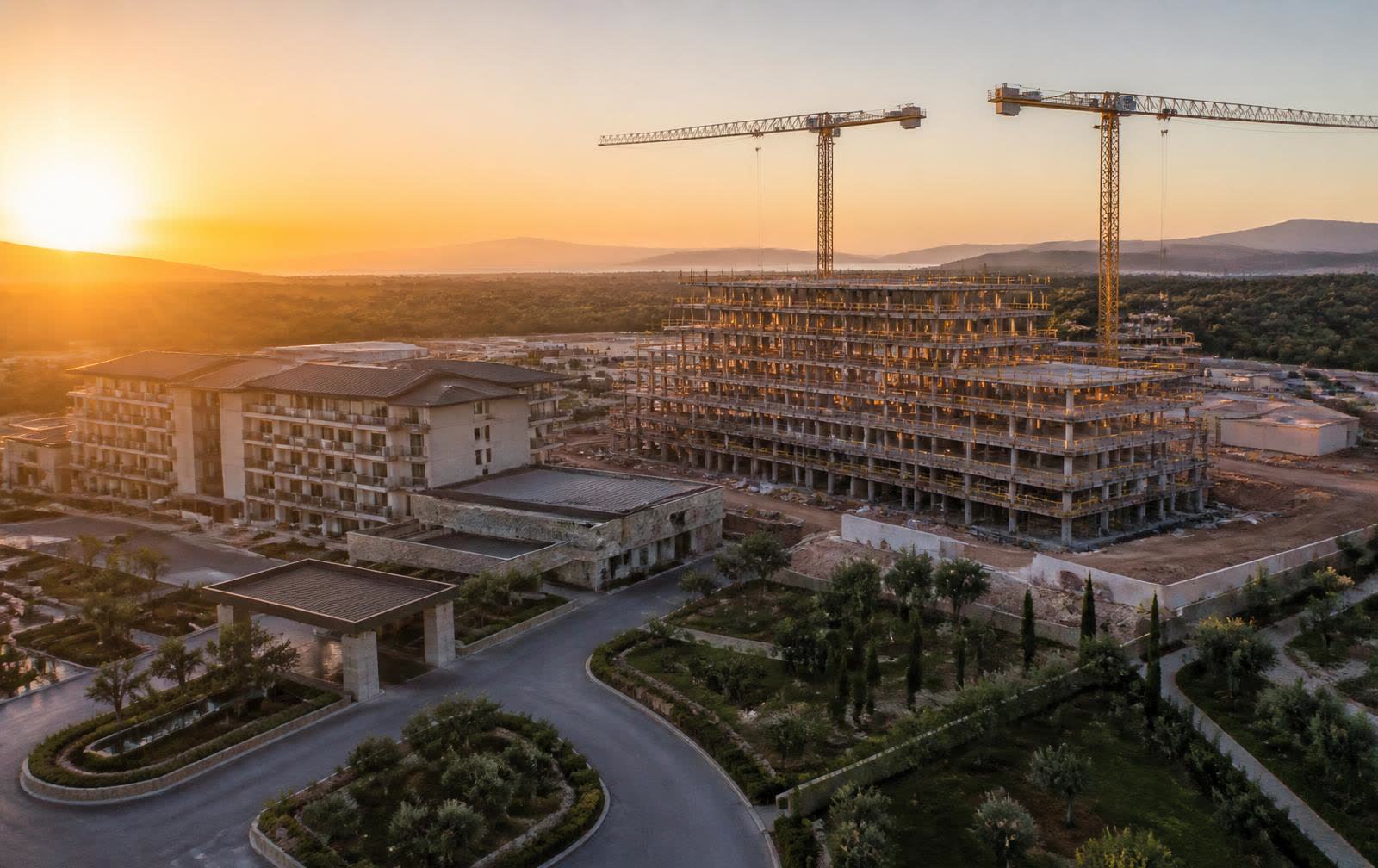 Hotel development site under construction at sunrise